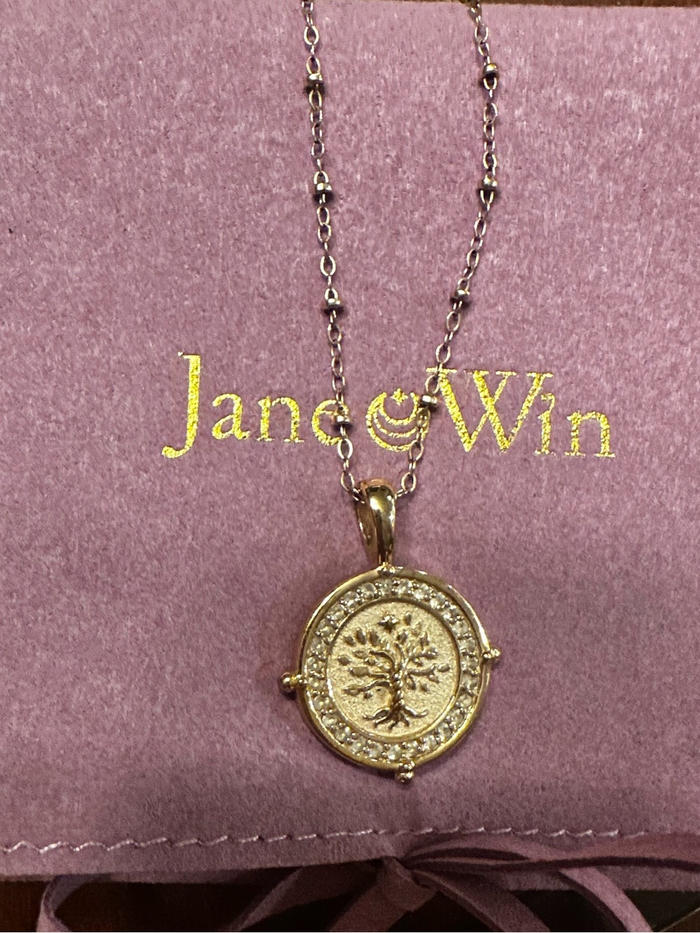 Jane Win petite embellished FAITH necklace. With Jane Win storage Pouch.